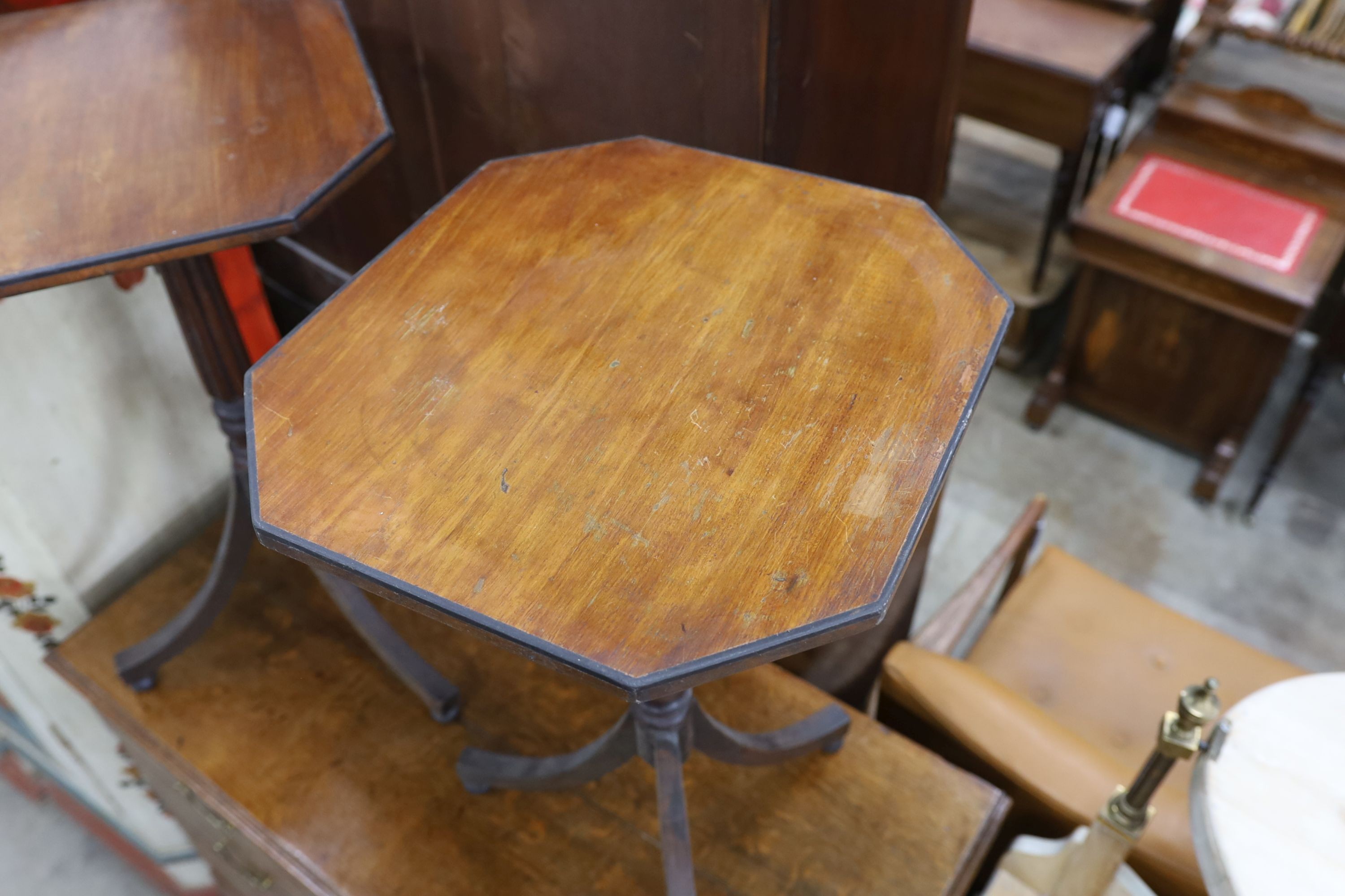 A pair of Regency style octagonal tripod wine tables, width 44cm, depth 39cm, height 73cm